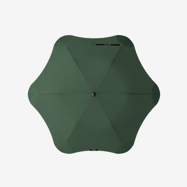 Green umbrella on a white background