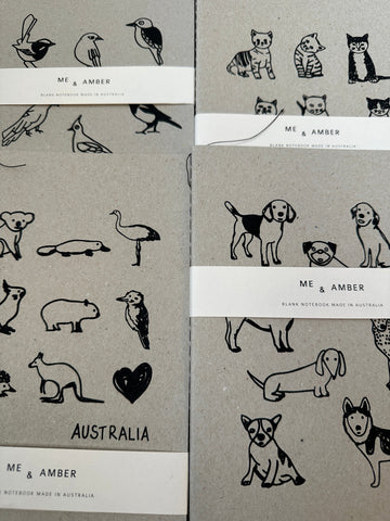 Notebooks With A Warble-Bow-Wow-Meow Factor.
