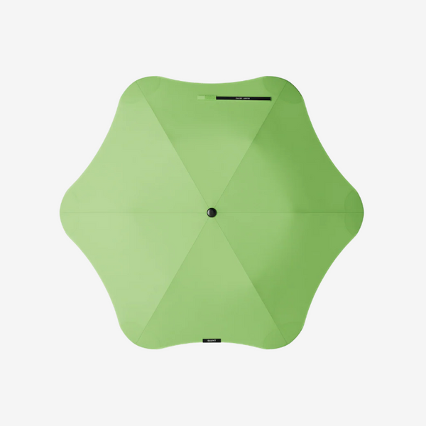 Green umbrella on a white background